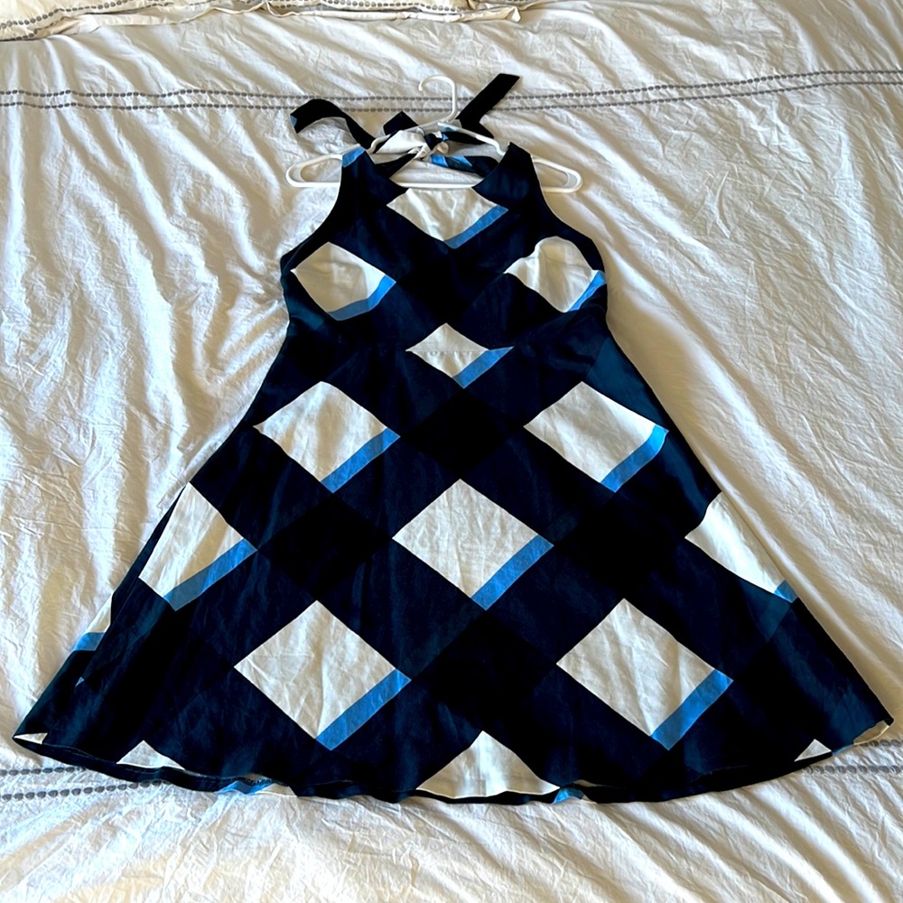 Fun and flirty summer dress with two straps, high front and mid back.